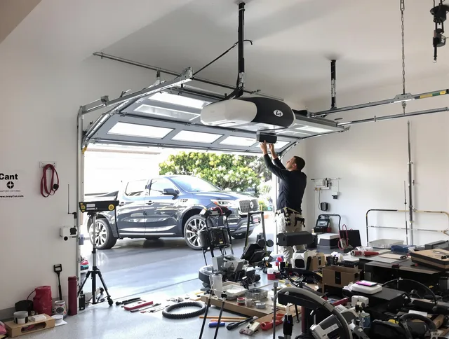 Cheshire Garage Door Repair specialist installing smart garage door opener system in Cheshire home
