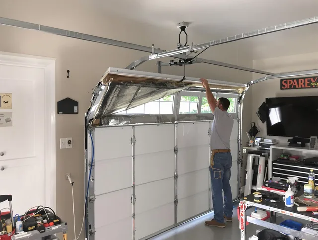 Garage door section replacement by Cheshire Garage Door Repair in Cheshire