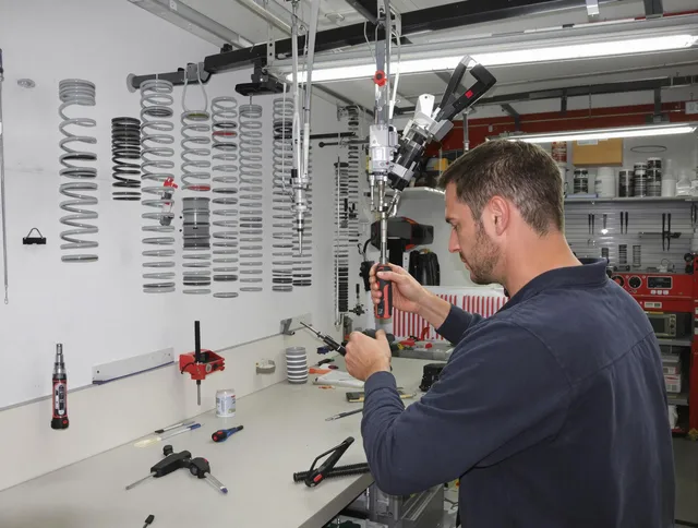 Cheshire Garage Door Repair safety certified technician performing precision spring replacement in Cheshire