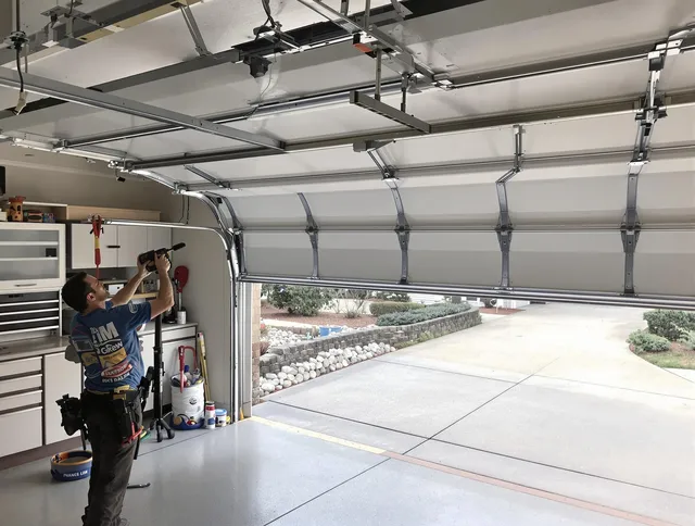 Garage door track repair service by Cheshire Garage Door Repair in Cheshire
